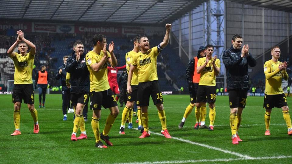 Millwall celebrate with their fans after winning at Preston.