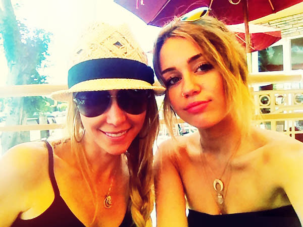 Miley Cyrus: Competing With Her Mom Tish For The Sexiest Outfit?