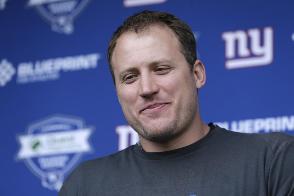 Things got heated during New York Giant minicamp on Thursday, and LT Nate Solder got rolled up on, but it appears he escaped injury. (AP)