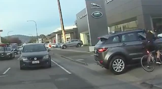 The cyclist rides back to the car. Photo: Instagram / AshleyGabrielle77