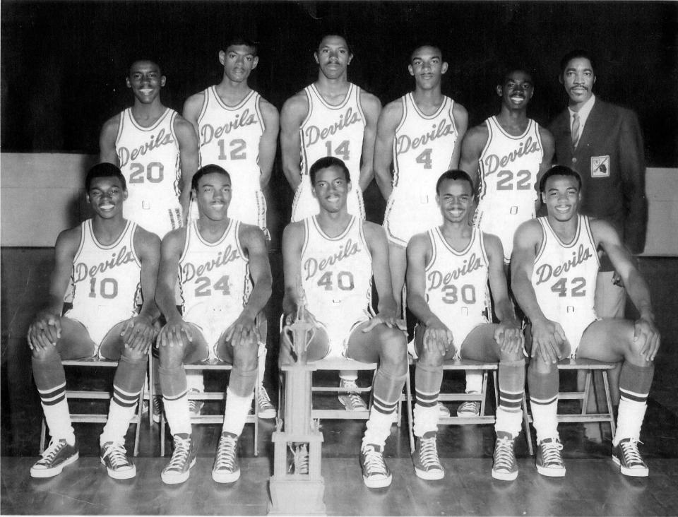 The 1967-68 Roosevelt High School basketball team and Coach Floyd Andrews (top row, right)  went 27-0 and became the first Black school to win state basketball playoffs that included Black and white teams.