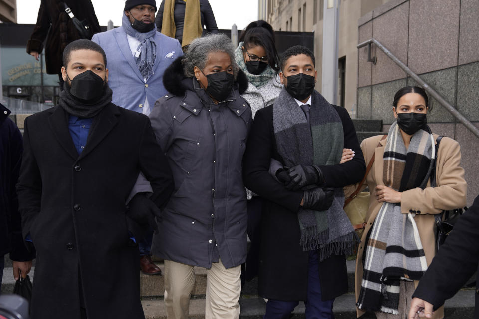 Actor Jussie Smollett, center, departs Tuesday, Dec. 7, 2021, with his mother Janet, left, and unidentified siblings the Leighton Criminal Courthouse after day six of his trial in Chicago. Closing arguments will begin Wednesday, in Chicago. (AP Photo/Charles Rex Arbogast)