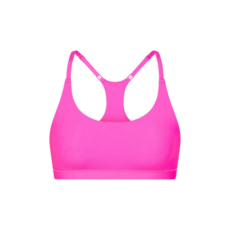 <p><a href="https://go.redirectingat.com?id=74968X1596630&url=https%3A%2F%2Fskims.com%2Fproducts%2Ffits-everybody-racerback-bralette-neon-pink&sref=https%3A%2F%2F" rel="nofollow noopener" target="_blank" data-ylk="slk:Shop Now;elm:context_link;itc:0;sec:content-canvas" class="link ">Shop Now</a></p><p>FITS EVERYBODY RACERBACK BRALETTE</p><p>$38.00</p><p>skims.com</p>