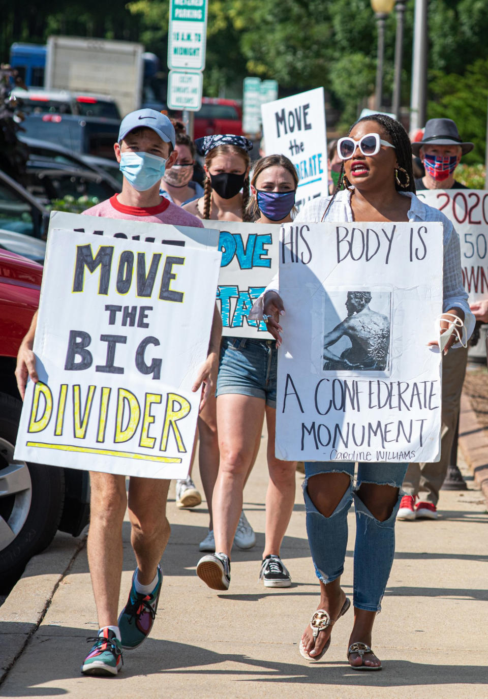 Image: Protesters march as the Lafayette County Board of Supervisors voted to keep a Confederate statue on the grounds of the Lafayette County Courthouse in Oxford, Miss. (Timothy Ivy / for NBC News)