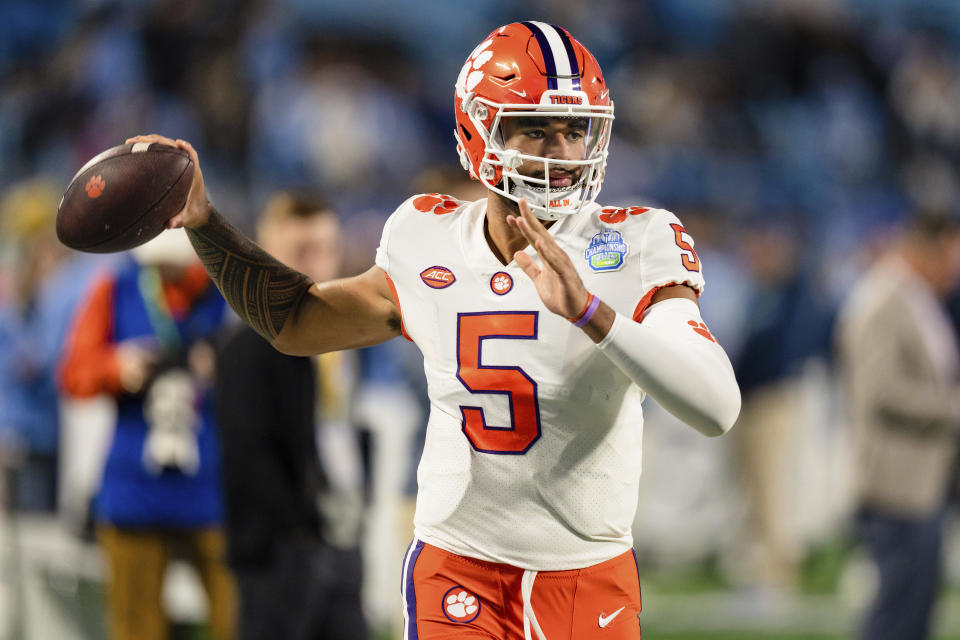 Clemson quarterback DJ Uiagalelei warms up before the Atlantic Coast Conference championship NCAA college football game against North Carolina on Saturday, Dec. 3, 2022, in Charlotte, N.C. (AP Photo/Jacob Kupferman)