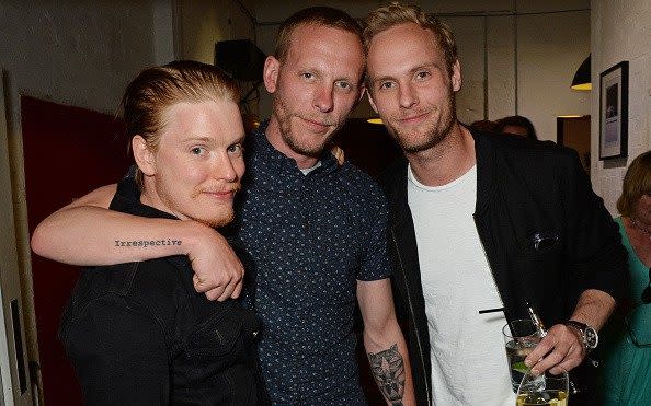 Freddie Fox with Laurence Fox and Jack Fox in 2016 - Getty