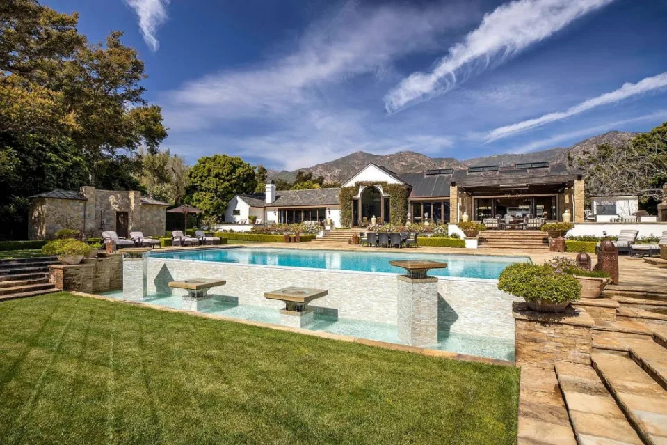 The estate spans over 9,100 square feet and holds eight bedrooms. Village Properties