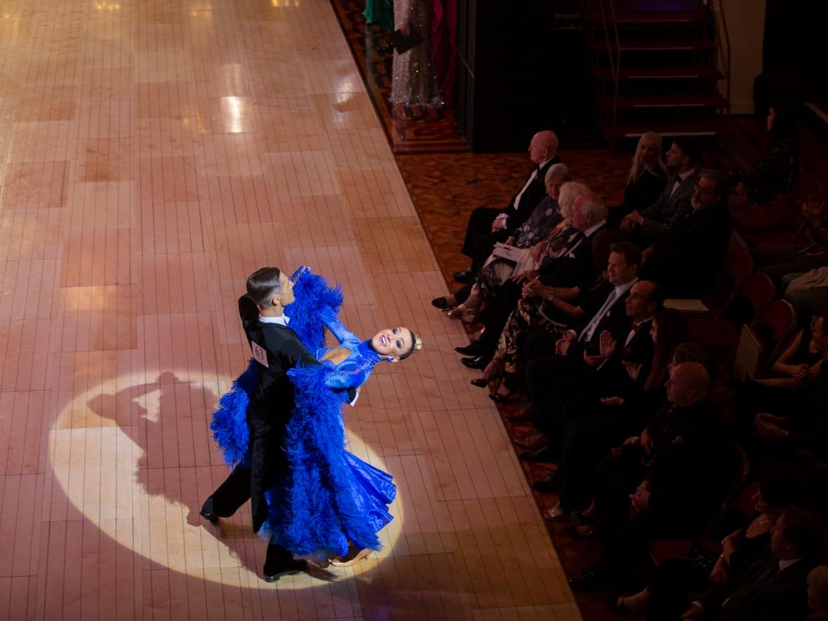 Nikita Druzhynin and Virginie Primeau perform the tango at the Blackpool Dance Festival in Blackpool, England, on May 31. (Bogdan Lytvynenko/CBC - image credit)