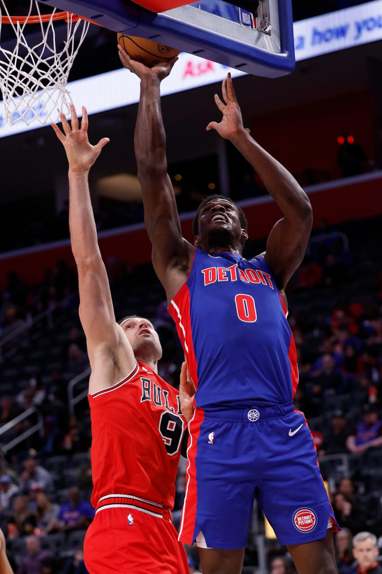 Pistons center Jalen Duren shoots on Bulls center Nikola Vucevic in the first half on Thursday, April 11, 2024, at Little Caesars Arena.