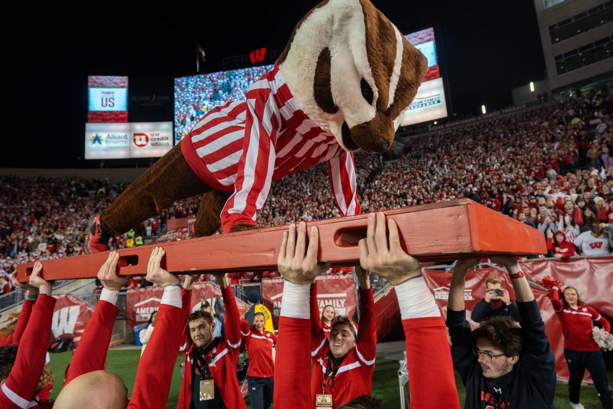 Bucky Badger does push ups after a Wisconsin touchdown during the second quarter of their game against Nebraska Saturday. Wisconsin won in overtime, 24-17.