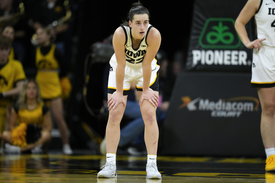 Iowa guard Caitlin Clark stands on the court during the second half of an NCAA college basketball game against Kansas State, Thursday, Nov. 16, 2023, in Iowa City, Iowa. Kansas State won 65-58. (AP Photo/Charlie Neibergall)