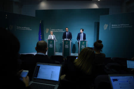 Journalists use their mobile phones and laptops as Taoiseach (Prime Minister) of Ireland Leo Varadkar speaks at a news conference with Minister for Health Simon Harris and Minister for Children Katherine Zappone announcing that the Irish Government will hold a referendum on liberalising abortion laws at the end of May, in Dublin, Ireland, January 29, 2018. REUTERS/Clodagh Kilcoyne