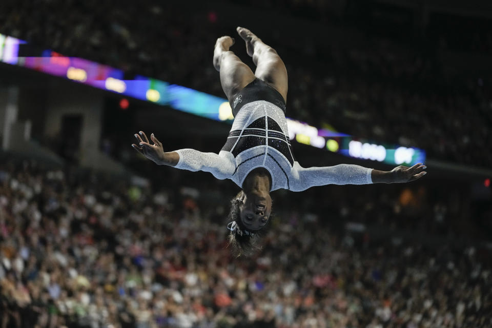 Simone Biles performs in the floor exercise at the U.S. Classic gymnastics competition Saturday, Aug. 5, 2023, in Hoffman Estates, Ill. (AP Photo/Morry Gash)