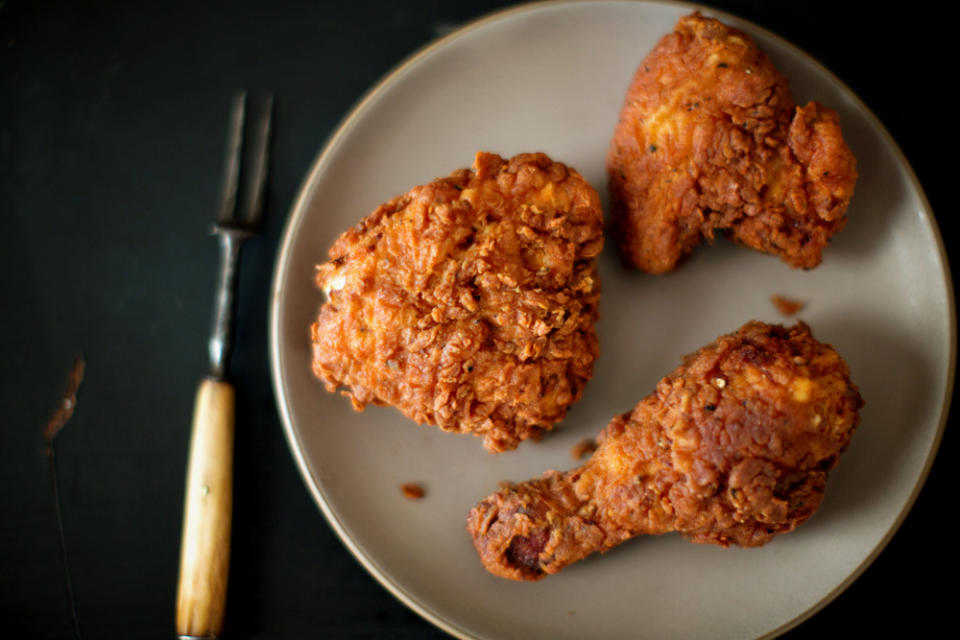 <div class="caption-credit"> Photo by: James Ransom</div><div class="caption-title">Michael Ruhlman's Rosemary-Brined, Buttermilk Fried Chicken</div><i><b><a rel="nofollow noopener" href="http://food52.com/recipes/19368-michael-ruhlman-s-rosemary-brined-buttermilk-fried-chicken" target="_blank" data-ylk="slk:Get the recipe on Food52;elm:context_link;itc:0;sec:content-canvas" class="link ">Get the recipe on Food52</a></b>. <br></i> <br> This is a fried chicken recipe you just can't mess up. A speedy rosemary lemon brine keeps the chicken flavorful and moist. Because of this (and its ultra-crispy buttermilk battered crust), the chicken will hold well in a warm oven for a couple hours before guests arrive, giving you plenty of time to wipe down the stove, shower, and pour yourself an early glass of wine. - Genius Recipes