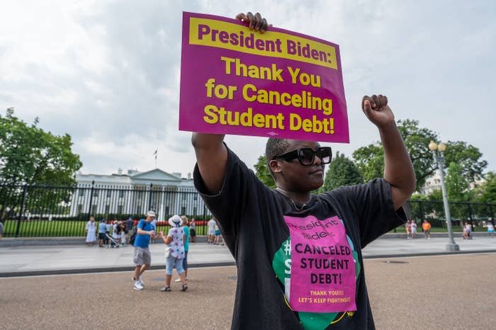 George Washington University student Tuana Gitonga and other student loan debt activists rally outside the White House on Aug. 25.