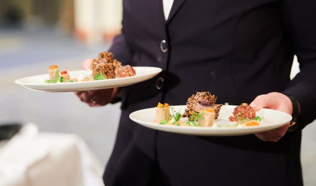 The new rule limits the circumstances under which restaurants can pay servers just $2.13 per hour. (Photo: Photo by Annette Riedl/picture alliance via Getty Images)