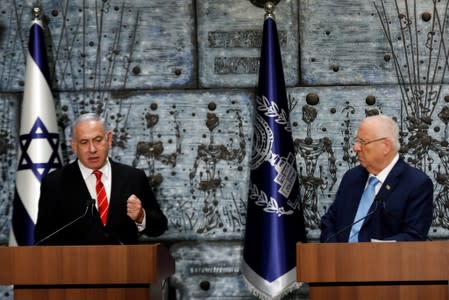 Israeli President Reuven Rivlin and Prime Minister Benjamin Netanyahu attend a nomination ceremony at the President's residency in Jerusalem