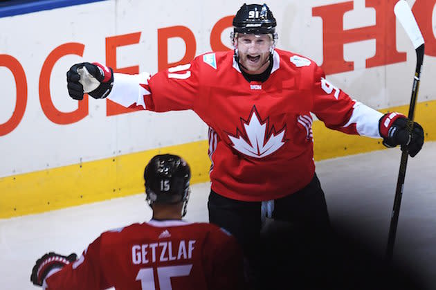 Canada's Steven Stamkos (91) celebrates his goal against Europe with teammate Ryan Getzlaf (15) during the first period of Game 1 of the World Cup of Hockey finals, Tuesday, Sept. 27, 2016, in Toronto. (Frank Gunn/The Canadian Press via AP)