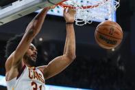 Cleveland Cavaliers' Jarrett Allen dunks during the first half of an NBA basketball game against the Milwaukee Bucks Monday, Dec. 6, 2021, in Milwaukee. (AP Photo/Morry Gash)