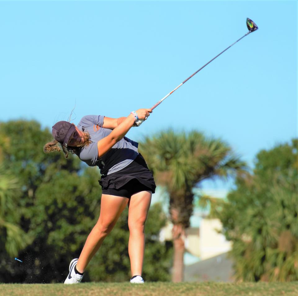 Lincoln Park Academy's Abby Smith hits her tee shot on the seventh hole against Vero Beach and Jensen Beach in a girls golf high school match at Pointe West Country Club in Vero Beach on Thursday, Oct. 6, 2022.