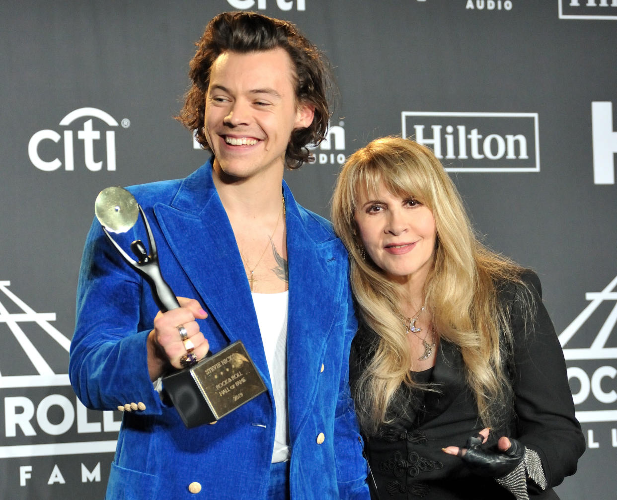 L-R: Harry Styles and Stevie Nicks in the press room at the 2019 Rock and Roll Hall of Fame Induction Ceremony at the Barclays Center in Brooklyn, NY on March 29, 2019. (Photo by Stephen Smith/SIPA USA)