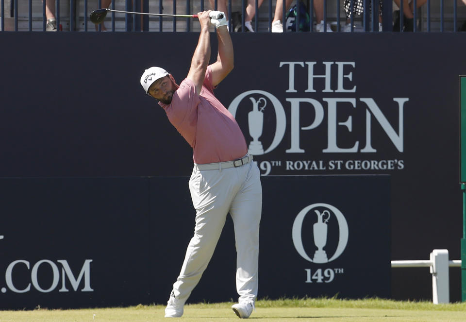 Spain's Jon Rahm tees off from the 1st hole during the final round of the British Open Golf Championship at Royal St George's golf course Sandwich, England, Sunday, July 18, 2021. (AP Photo/Peter Morrison)