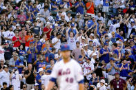 Fans cheer on New York Mets' starting pitcher Jacob deGrom during the fourth inning of a baseball game against the Atlanta Braves, Sunday, Aug. 7, 2022, in New York. (AP Photo/Julia Nikhinson)