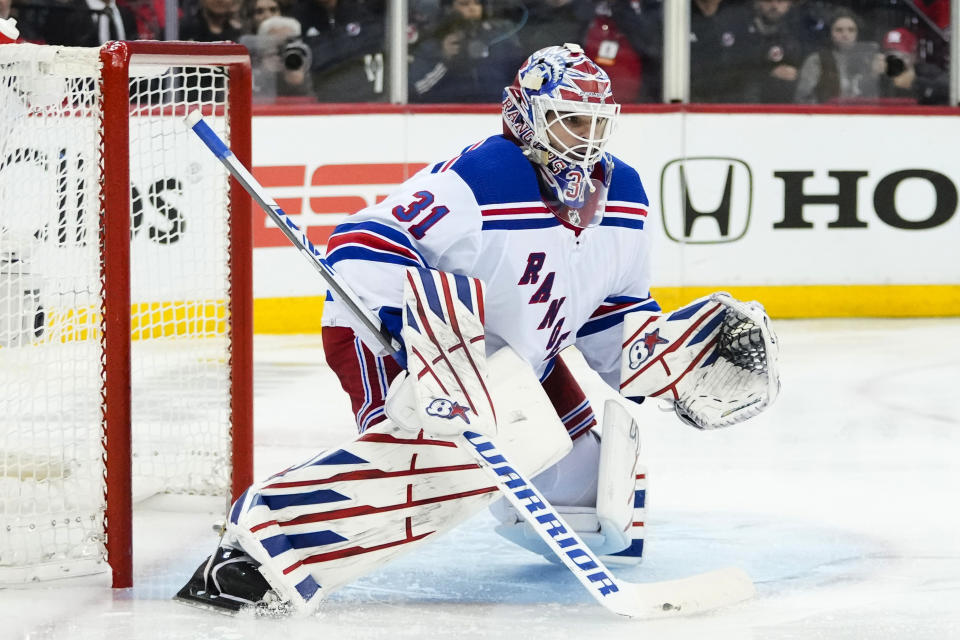 New York Rangers goaltender Igor Shesterkin watches the puck during the second period of Game 5 of the team's NHL hockey Stanley Cup first-round playoff series against the New Jersey Devils on Thursday, April 27, 2023, in Newark, N.J. (AP Photo/Frank Franklin II)