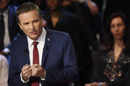 Nicolas Dupont-Aignan of Debout La France group attends a prime-time televised debate for the candidates at French 2017 presidential election in La Plaine Saint-Denis, near Paris, France, April 4, 2017. REUTERS/Lionel Bonaventure/Pool