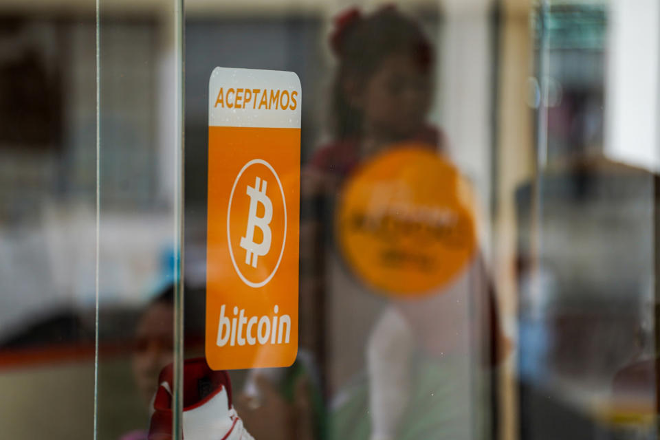 SAN SALVADOR, EL SALVADOR – 05/30/2023: A sign accepting bitcoins is seen in San Salvador. The Bukele government has completed its fourth year in office ahead of a contentious re-election. The country has been under a state of emergency to combat gangs for 14 months, during which more than 68,000 suspected gang members have been arrested. Last year, the country recorded some of its highest inflation figures ever and was on the brink of default as the country has little liquidity. As it continues to push for bitcoin, it has failed to reach an agreement with the IMF. (Photo by Camilo Freedman/SOPA Images/LightRocket via Getty Images)