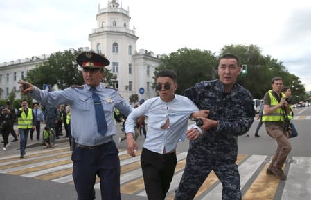 Kazakh opposition supporters hold a rally in Almaty