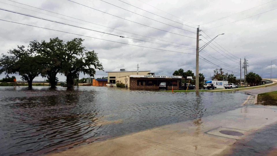 Water fills the streets near Jacksonville's Trout River Fish Co.