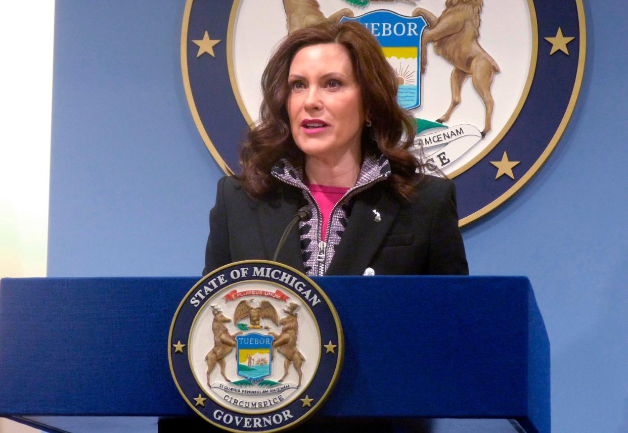 Michigan Gov. Gretchen Whitmer speaks at a news conference in March. Whitmer's office says she was on a list of targets of a gunman who fatally shot a judge in Wisconsin.