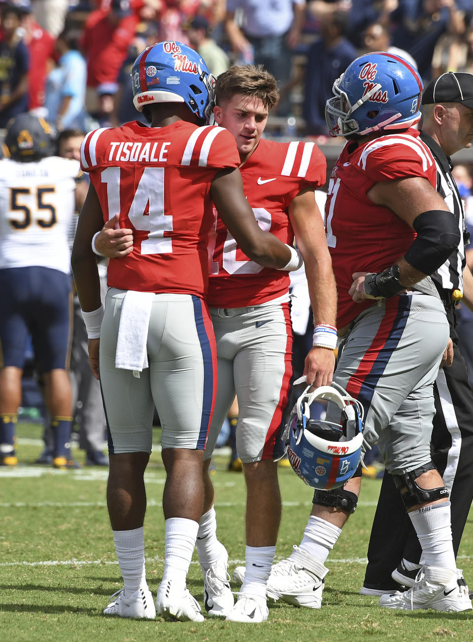 Mississippi's Grant Tisdale (14) consoles John Rhys Plumlee (10) after an NCAA college football game against California in Oxford, Miss., Saturday, Sept. 21, 2019. California won 28-20. (AP Photo/Thomas Graning)