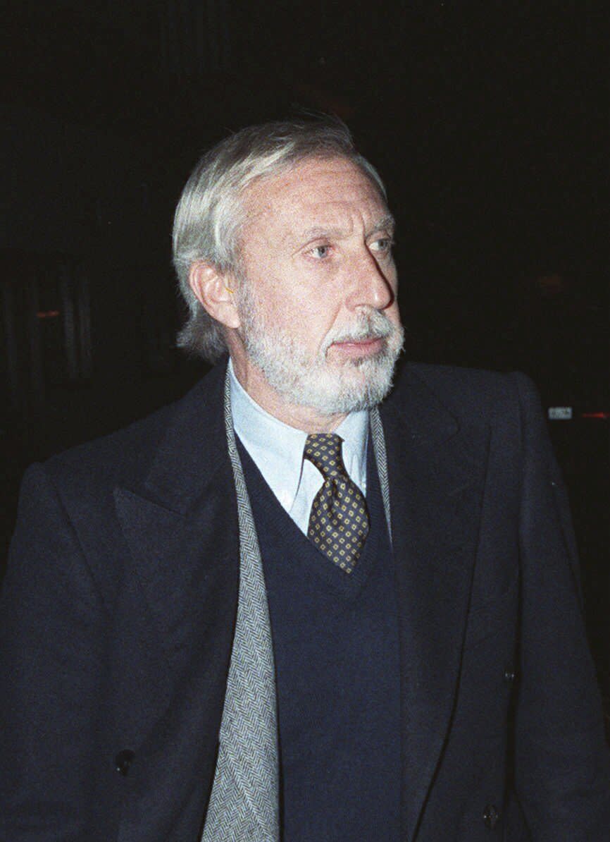 FILE - Ivan Boesky leaves a Brooklyn half-way on Dec. 12, 1989. Boesky, the flamboyant stock speculator whose cooperation with the government cracked open one of the largest insider trading scandals on Wall Street, has died at the age of 87. (AP photo/David Cantor, File)