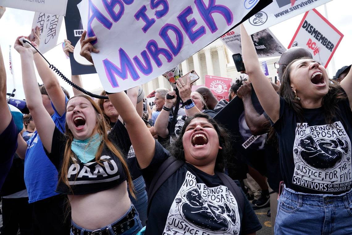 People celebrate outside the U.S. Supreme Court after the Court ended constitutional protections for abortion that had been in place nearly 50 years. (AP Photo/Jacquelyn Martin)