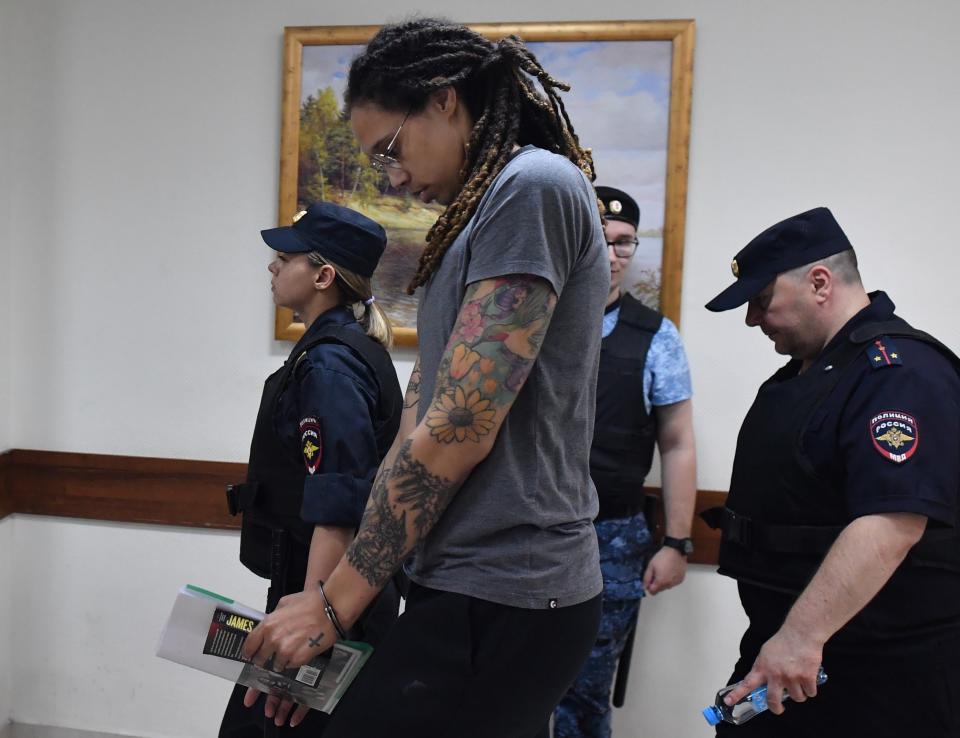 US basketball star Brittney Griner is seen after the verdict announcing at the Khimki court, outside Moscow, Russia. Brittney Griner, a two-time Olympic gold medalist in basketball, was detained at a Moscow airport in February after a police dog alerted officers to a vape cartridge containing cannabis extracts in her luggage. A judge has sentenced Griner to nine years in prison.