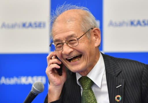 Japanese chemist Akira Yoshino receives a congratulatory call from Japan's Prime Minister Shinozo Abe