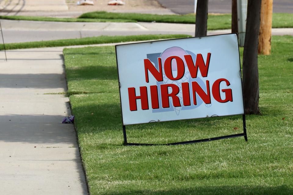 A "now hiring" sign is seen outside Braum's Ice Cream & Dairy Store at 4629 S Western St. in Amarillo.