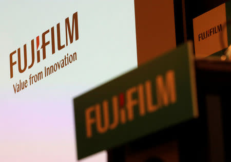 Fujifilm Holdings' logos are pictured ahead of its news conference in Tokyo, Japan January 31, 2018. REUTERS/Kim Kyung-Hoon