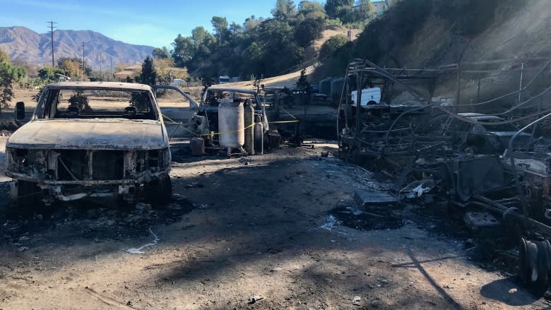 Houses built too close to bush spread huge California fires on 'front line of climate change'