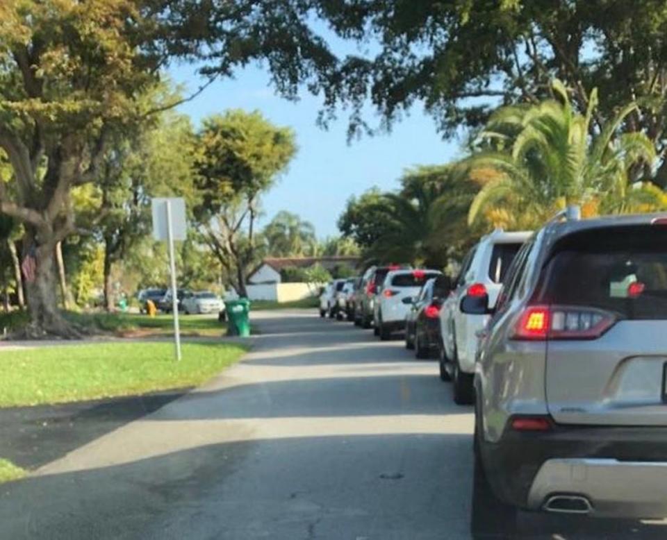 Traffic backed up on Calusa Club Drive. Neighbors oppose a housing development on the defunct golf course because they say it will add to gridlock in West Kendall.