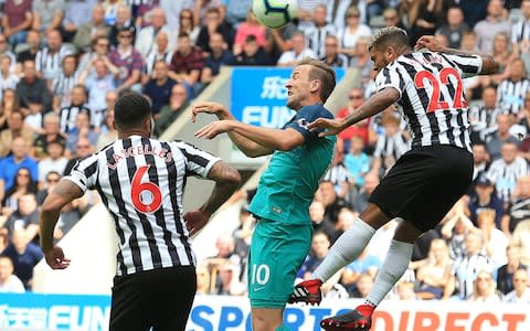 Tottenham Hotspur's English striker Harry Kane (C) vies with Newcastle United's English defender Jamaal Lascelles (L) and Newcastle United's US defender DeAndre Yedlin - Credit: AFP/Getty