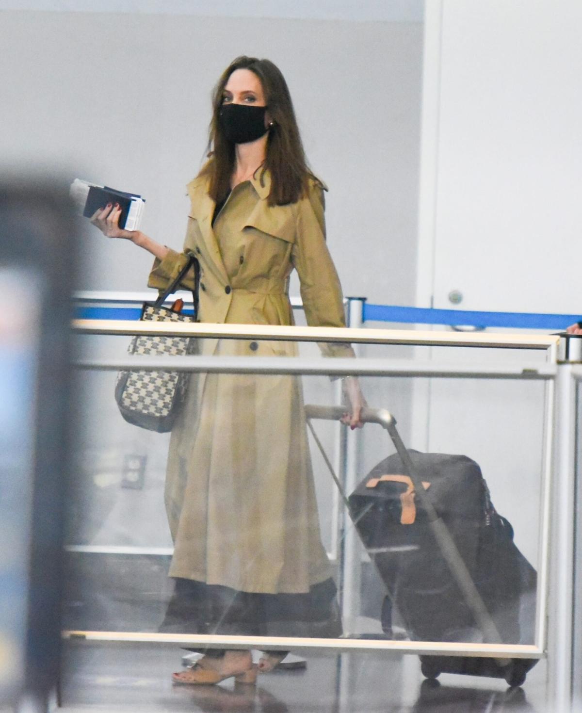 Angelina Jolie Elevated Her Airport Style with a Chic Trench Coat