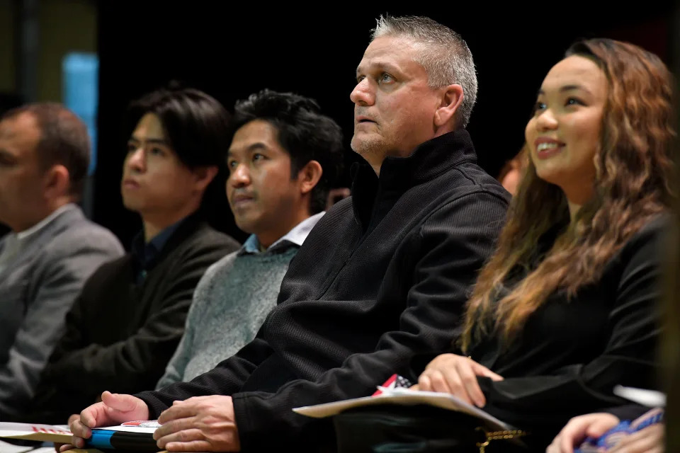 Tears well up in the eyes of Richard Jesus Peraza, an immigrant from Cuba as he listens to the Riverside High School Combined Chorus sing &quot;America the Beautiful&quot; at the end of the naturalization ceremony which saw him and 39 others become U.S. citizens in January.