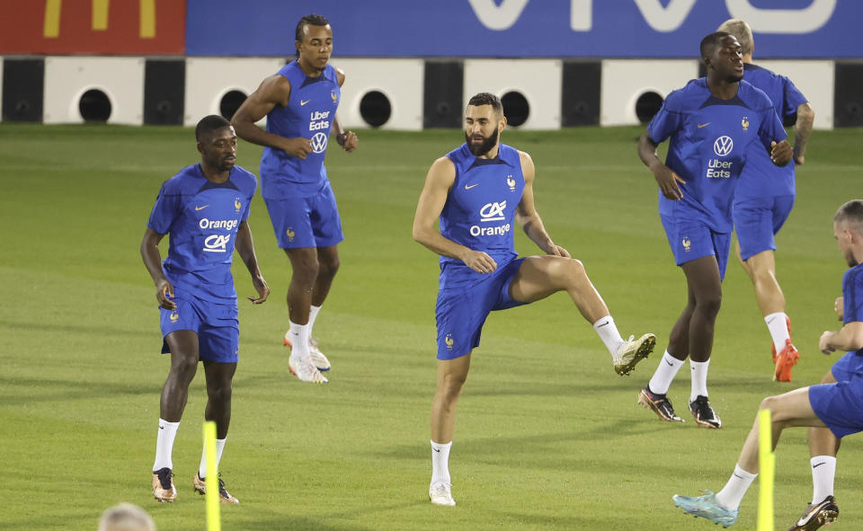 DOHA, QATAR - NOVEMBER 19: Karim Benzema, Ousmane Dembele (left) of France during Team France practice ahead of the FIFA World Cup Qatar 2022 at Al Sadd SC Stadium on November 19, 2022 in Doha, Qatar. (Photo by Jean Catuffe/Getty Images)