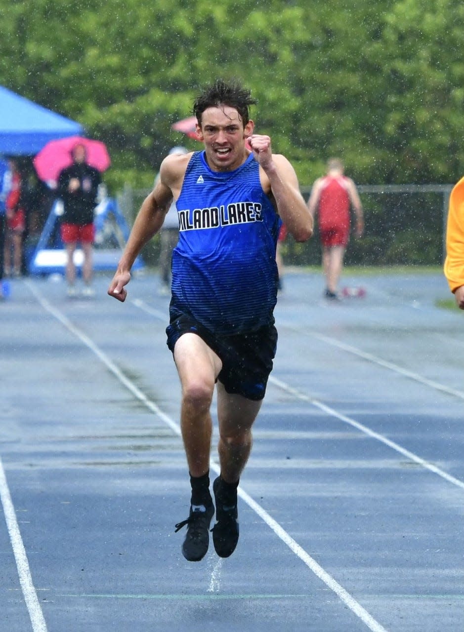 Inland Lakes' Sam Mayer makes a surge during a sprinting event on Wednesday. The Inland Lakes boys took second place as a team.