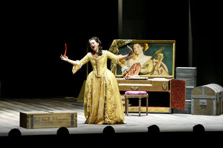 A performer takes part in a dress rehearsal for the Barber of Seville ahead of the opening of the first Dubai Opera house, the UAE August 30, 2016. REUTERS/Ahmed Jadallah