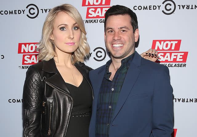 <p>Jesse Grant/Getty</p> Nikki Glaser and Chris Convy attend the "Not Safe With Nikki Glaser" Season One Premiere Party on February 8, 2016 in West Hollywood, California.