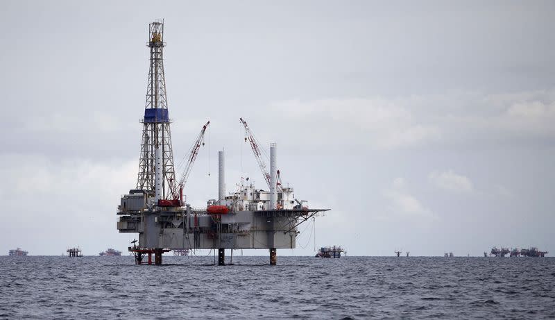 FILE PHOTO: A view of a drilling rig and distant production platform in the Soldado Field off Trinidad's southwest coast